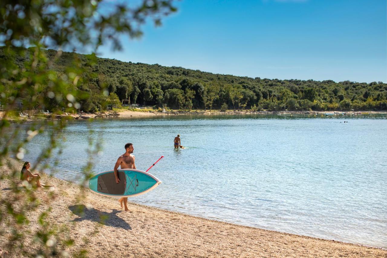 Maistra Camping Vestar Mobile Homes Rovigno Esterno foto The beach at Lake Travis State Park